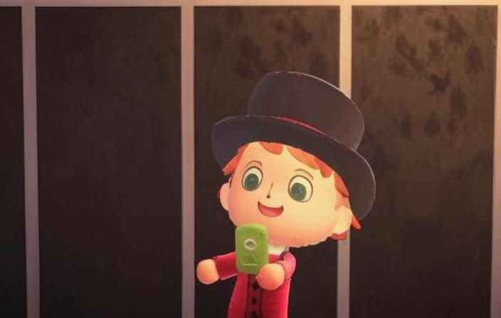 An Animal Crossing character dressed like Willy Wonka takes a selfie.